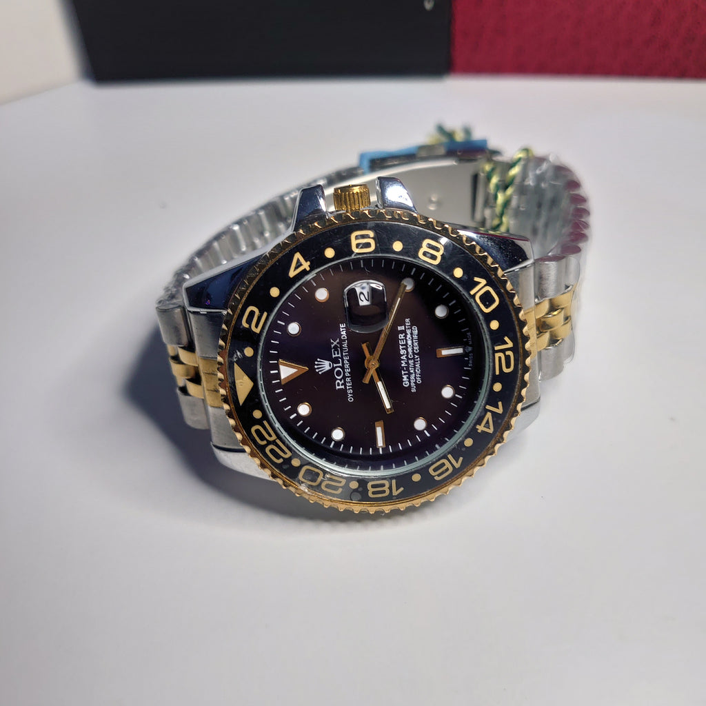 GMT-Master II – أسود وذهبي